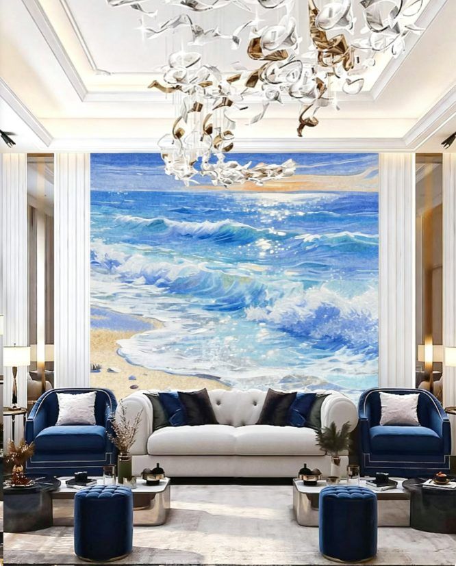 Ocean wave glass mosaic wall mural in deep blue turquoise and gold above a sofa in a coastal living room
