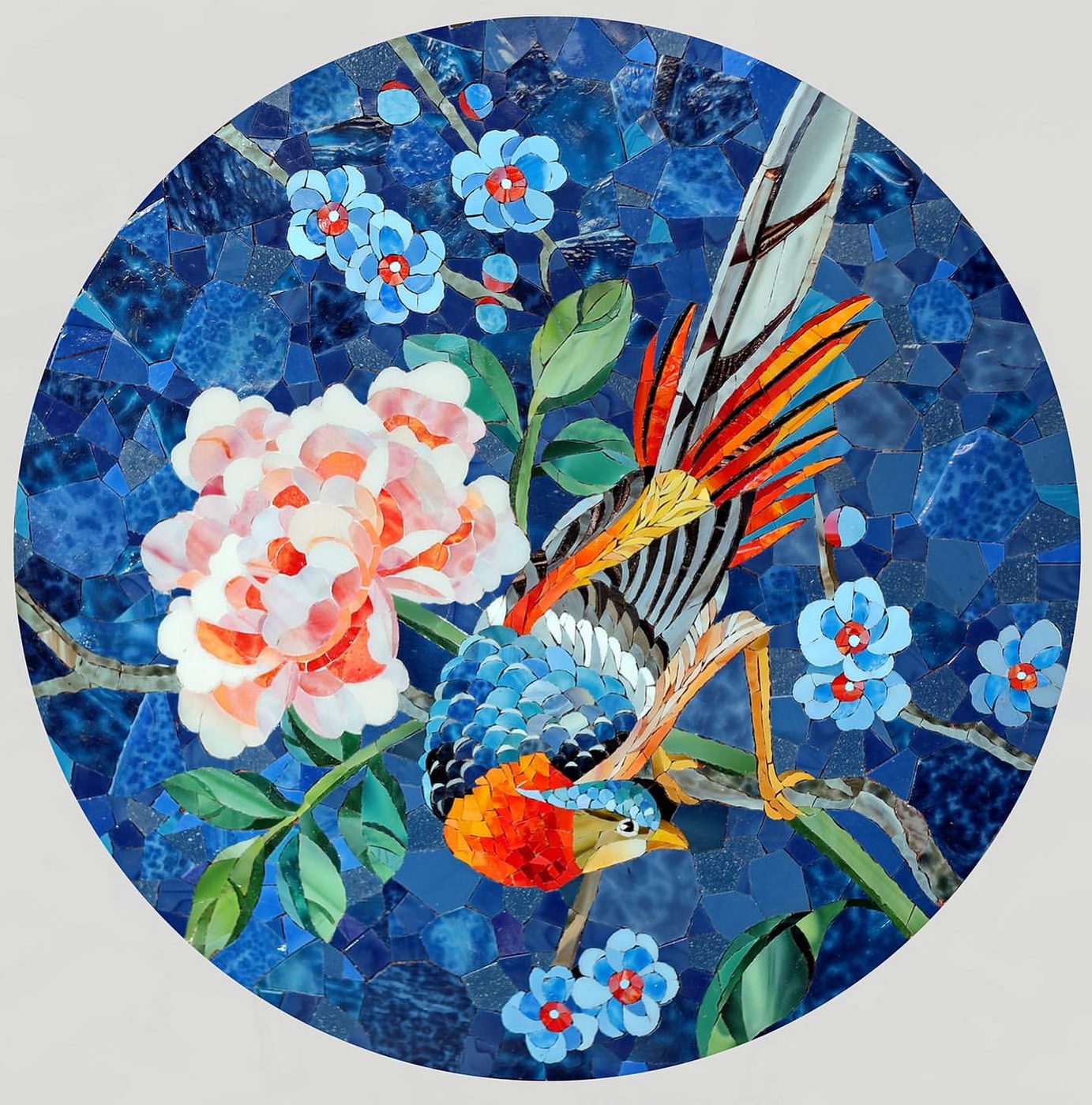 Circular mosaic roundel with a bird among blossoms — custom mosaic wall art by Art Mosaic Factory