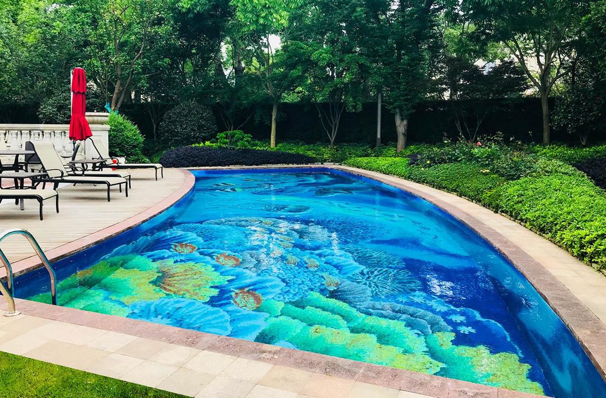 Coral reef mosaic pool floor — handcut mosaic art by Art Mosaic Factory